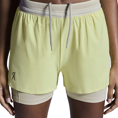 On Women's 3" Performance 2/1 Shorts - BlackToe Running#colour_limelight-sand