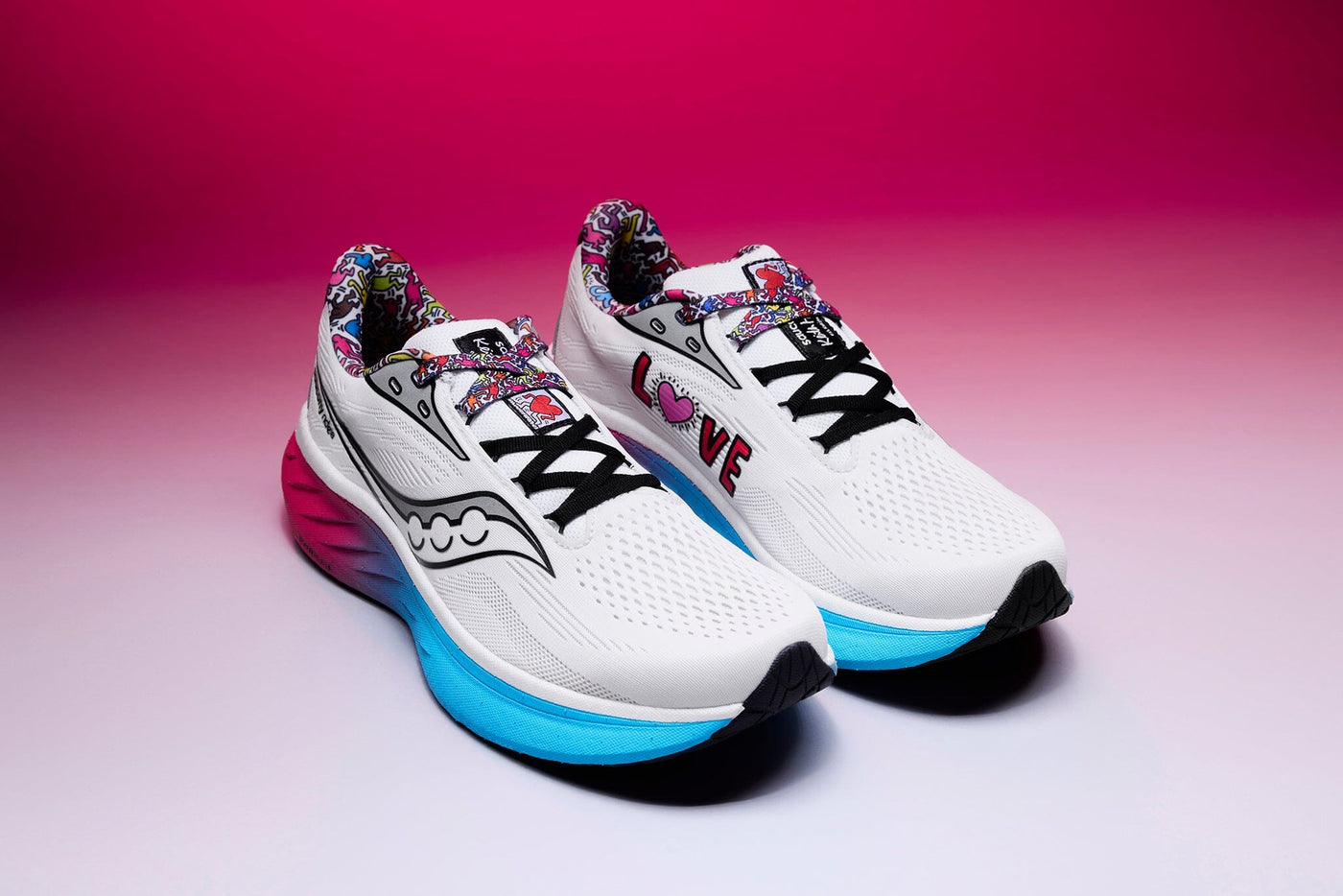 Saucony Women's Ride 18 - Keith Haring Love Capsule Women's Shoes - BlackToe Running - 