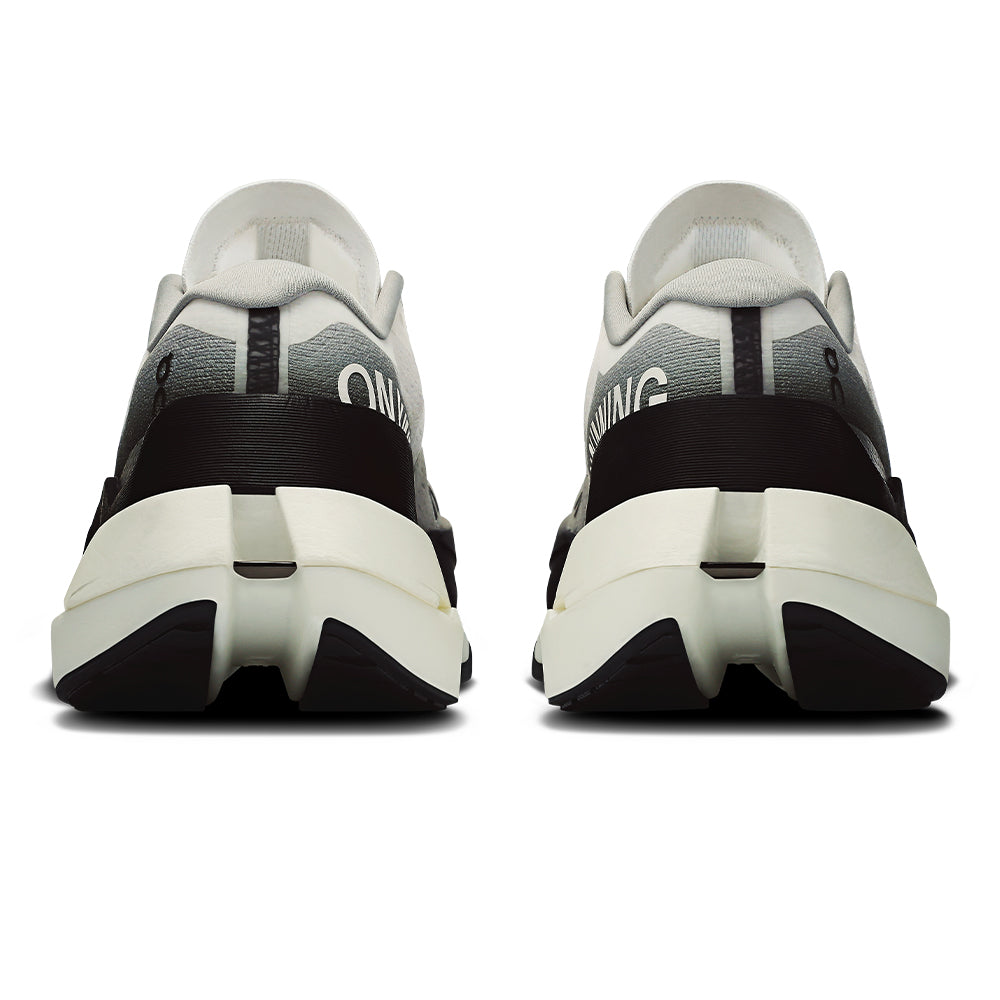 On Women's Cloudboom Max - BlackToe Running#colour_white-black