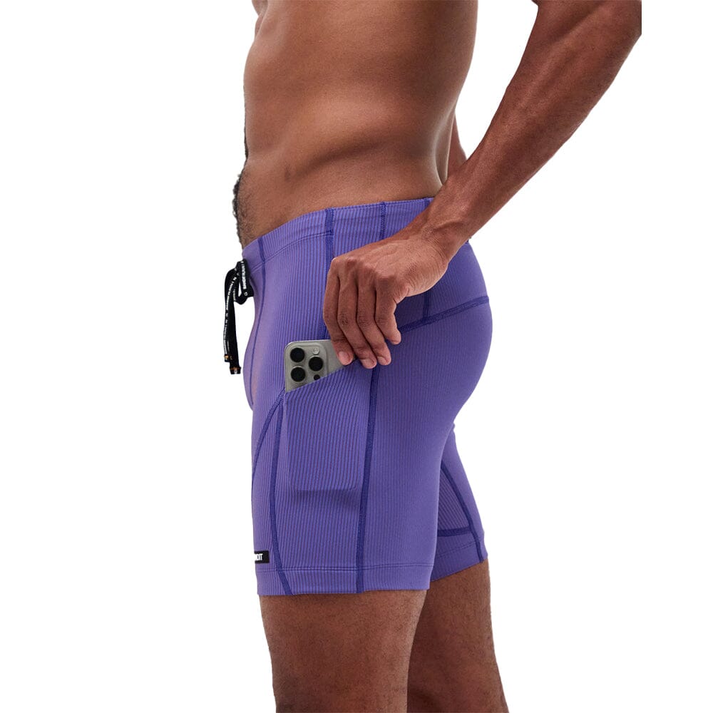Bandit Running Striped Cadence 7 Pocket Quarter Tights - BlackToe Running#colour_deep-peri-blue-rust