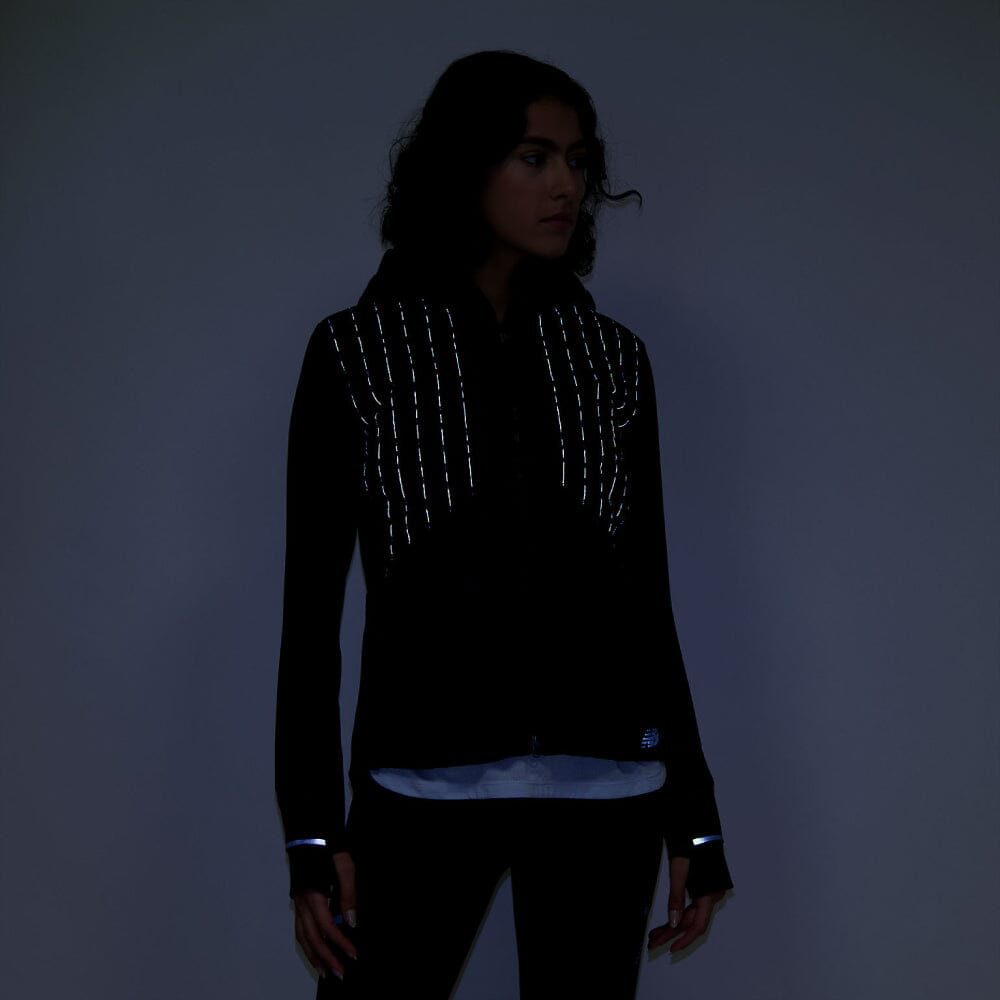 New Balance Women's Impact Run Luminous Heat Jacket - BlackToe Running#colour_black