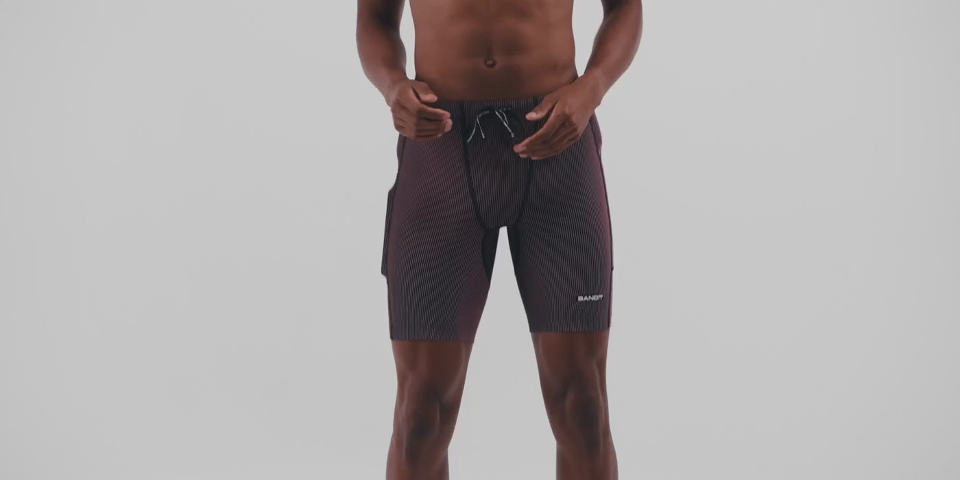 Bandit Running Men's Striped Cadence 7 Pocket Half Tights - BlackToe Running#colour_black-mauve